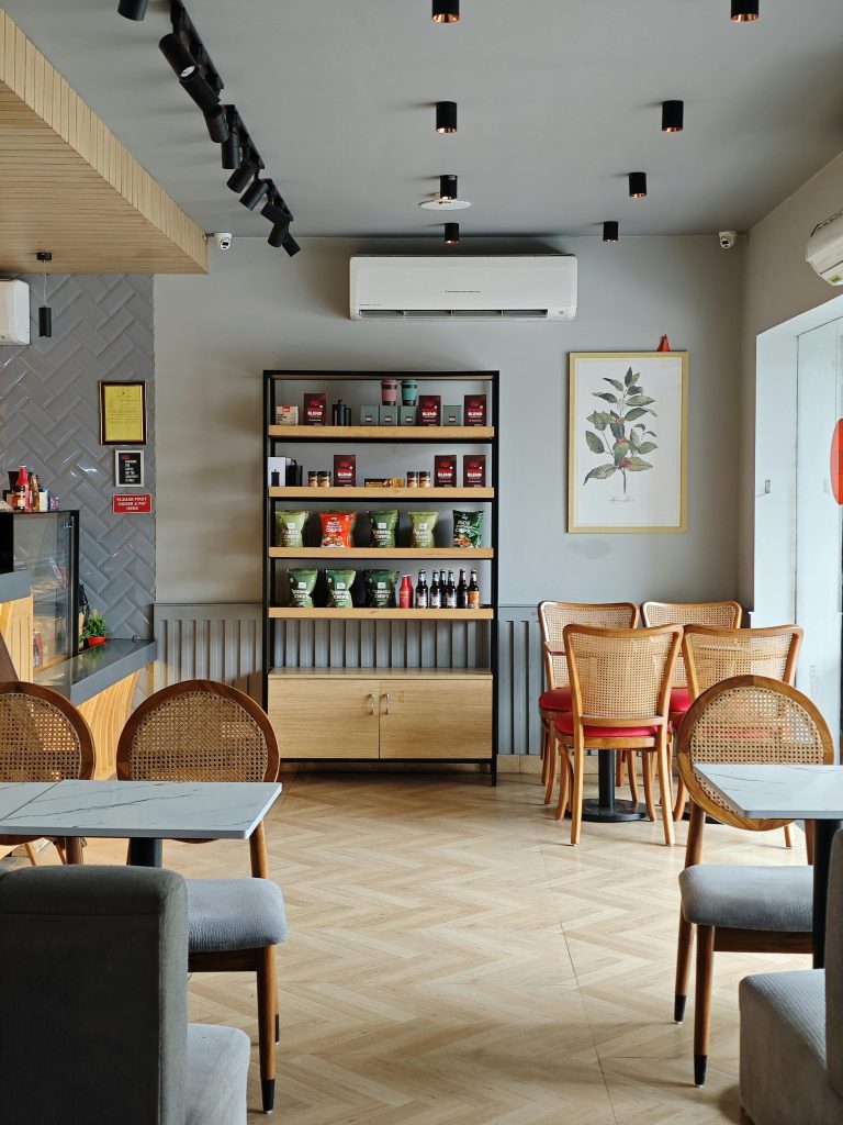 pexels photo 33067369 33067369 Discover the stylish and modern interior of a café in Mathura, Uttar Pradesh, featuring elegant furniture and inviting ambiance.